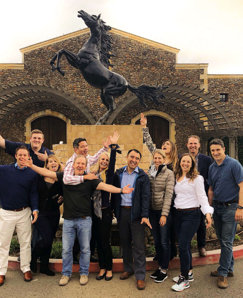 Group of people in front of Black Stalion horse statue